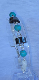 Bracelet en acier inoxydable, pierre naturelles et perles de coquillage blanc nacré par les élégantes de Stéph